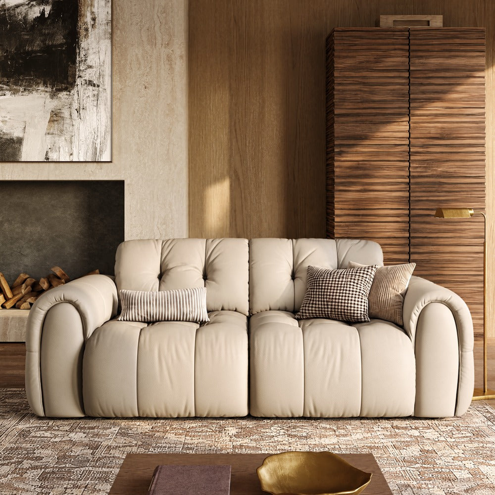 88-inch beige leather tufted sofa in a living room, front view
