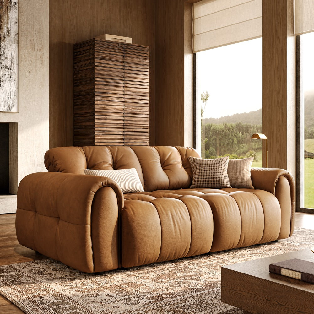 Brown leather tufted modular sofa with two armless seats and two armrests, front view in a living room
