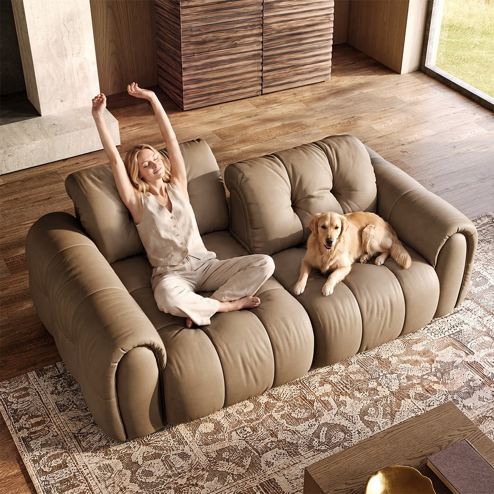 88-inch khaki top-grain leather tufted modular sofa in a living room
