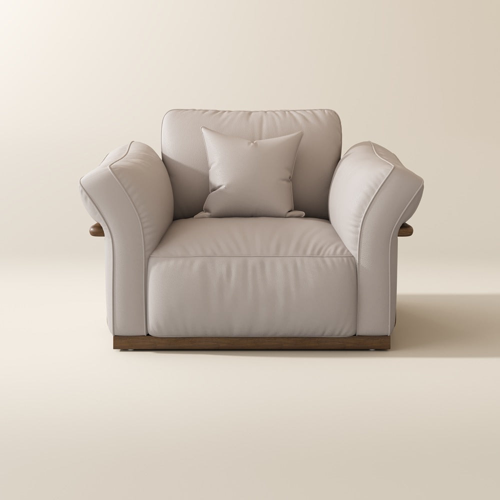 Beige top-grain leather accent chair, front view on a plain background