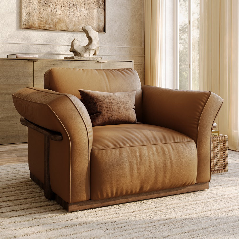 Brown top-grain leather accent chair with solid wood frame in a living room