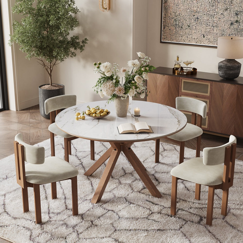 47-inch white sintered stone round dining table in a dining room