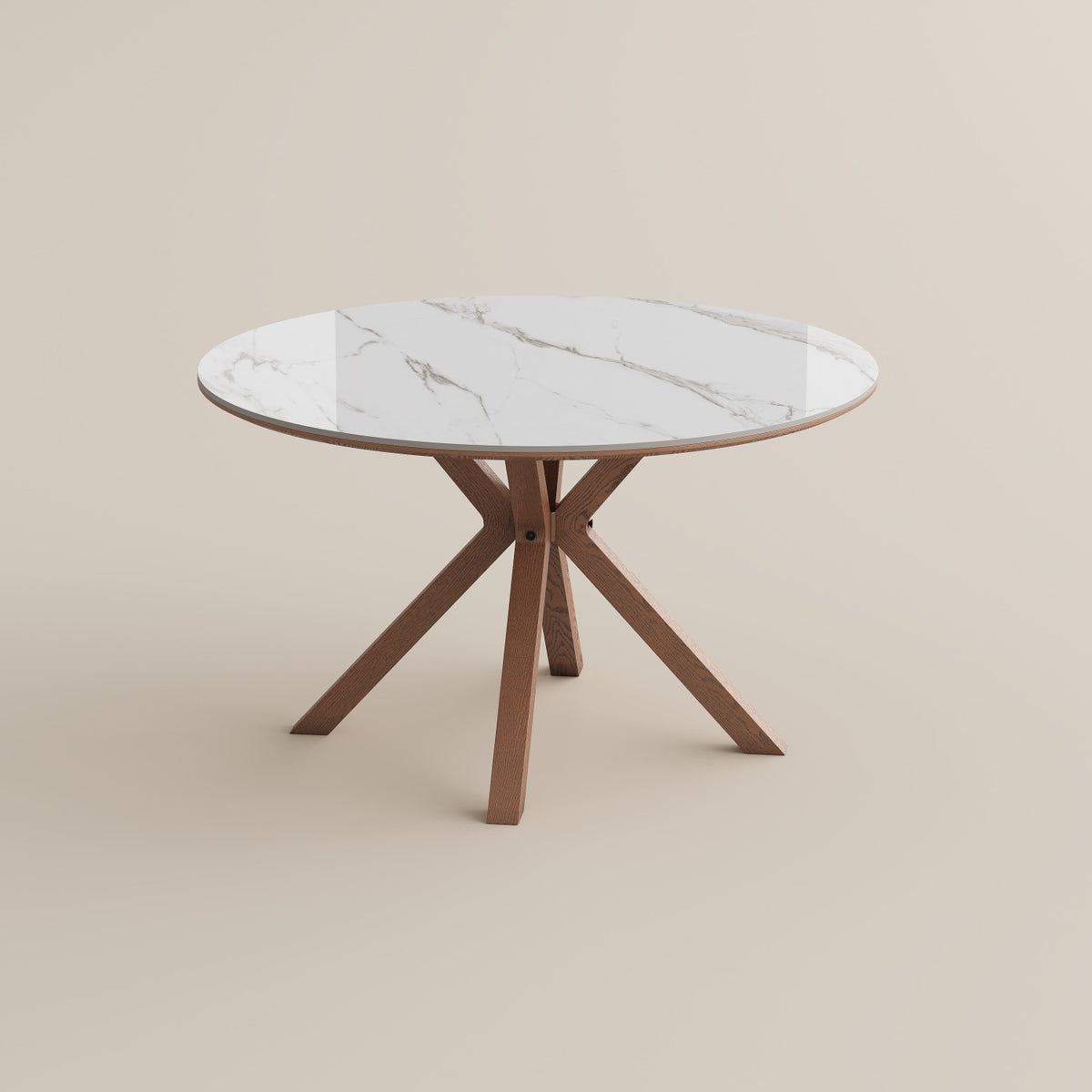 White sintered stone round dining table on a plain background