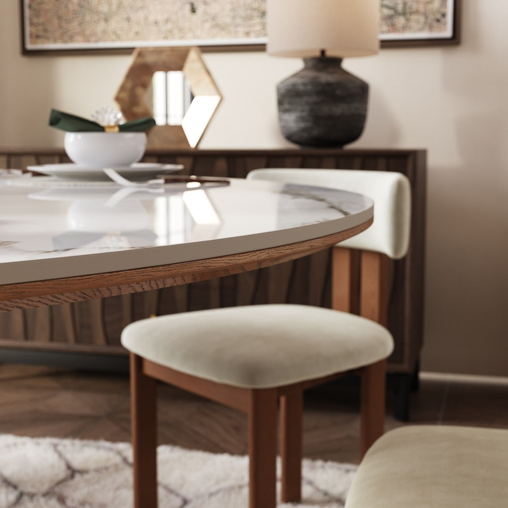 Close-up of glossy white round tabletop edge