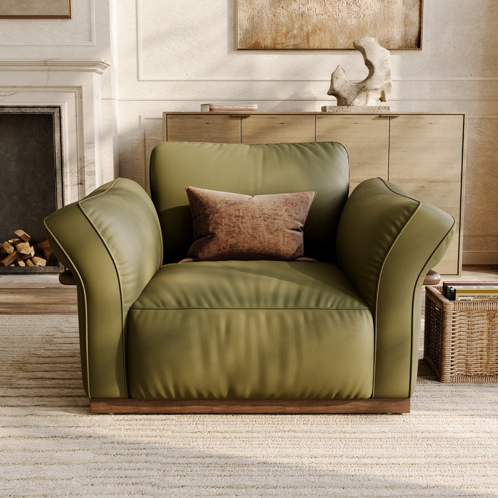 Green leather accent chair, front view in a living room