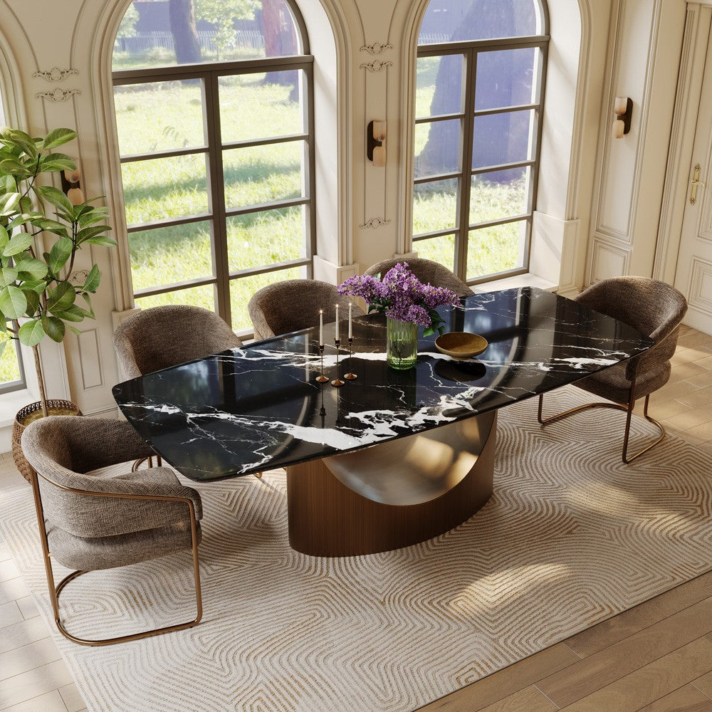 94.5" rectangular black marble dining table with curved bronze pedestal base in a dining room (chairs not included)
