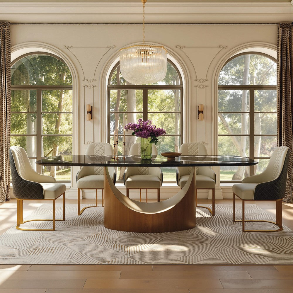 Black marble dining table with bronze pedestal in a formal dining room, wide view (chairs not included)