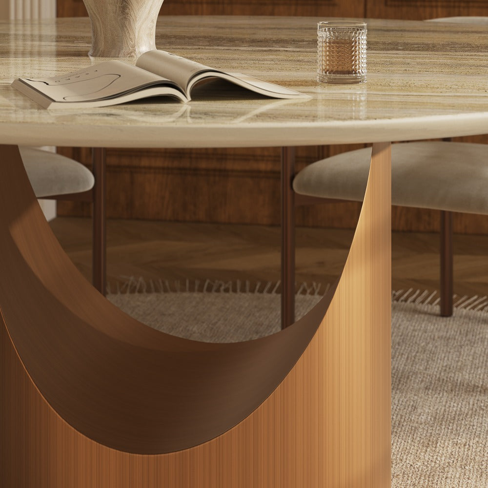 Curved bronze-finish stainless steel pedestal base, close-up