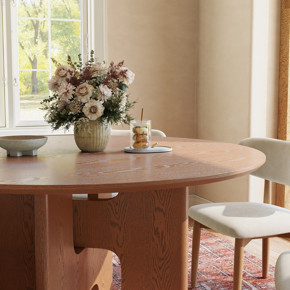 Round wood dining table edge and base detail in walnut color