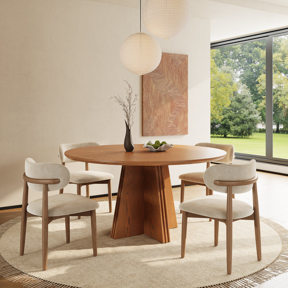 Silva round wood dining table in walnut color in a bright dining room