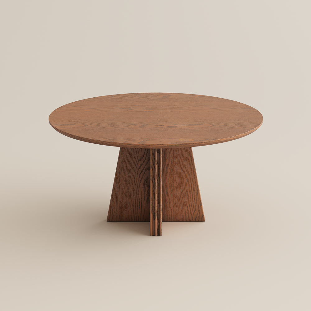 Silva 59" round wood dining table in walnut color, studio view