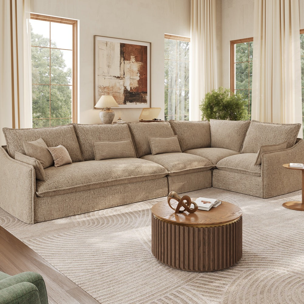 Khaki L-shaped sectional sofa with deep seats in a bright living room
