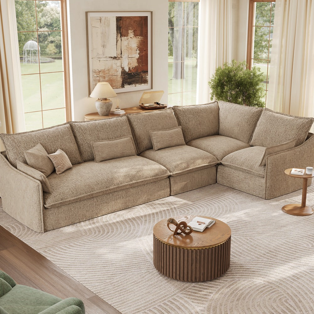 Khaki L-shaped sectional sofa with corner return and throw pillows