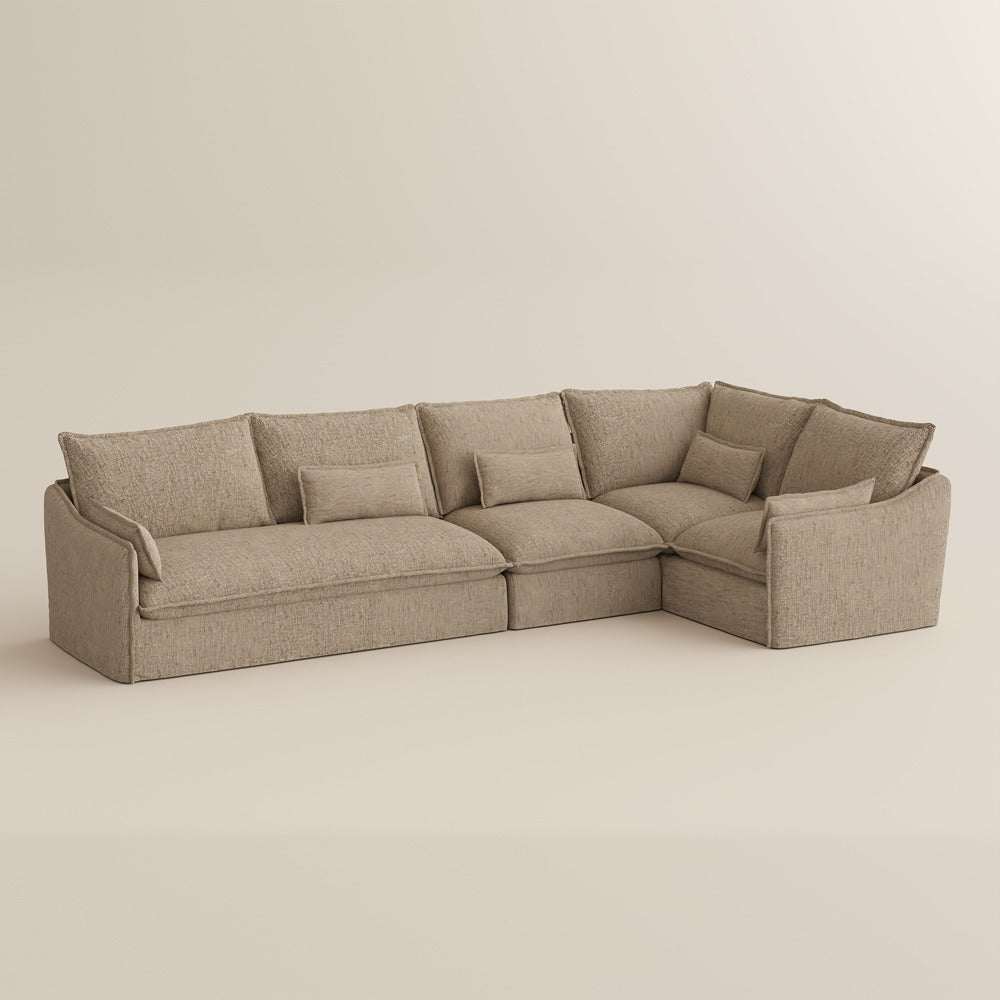 Khaki L-shaped sectional sofa, front view on a plain background