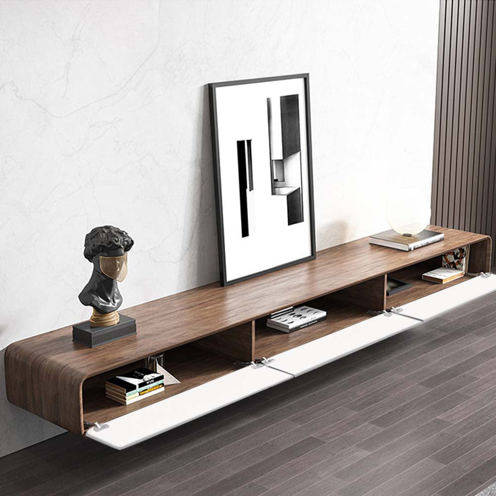 Floating TV stand with flip-down doors open showing storage compartments